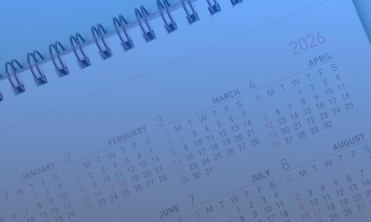 Close-up of a 2026 calendar illustrating the timeline for when the EU’s pay transparency rules and pay reporting requirements come into effect for HR departments.
